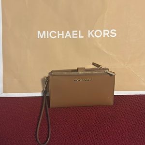 Brown wallet/wristlet… two zipper pockets enough room for cc/id